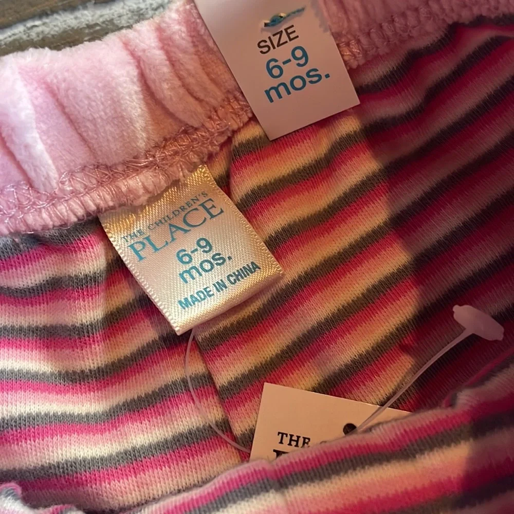 The Children’s place 3 piece set.  Pink Pants, Jacket & bib.  Size 6-9 months
